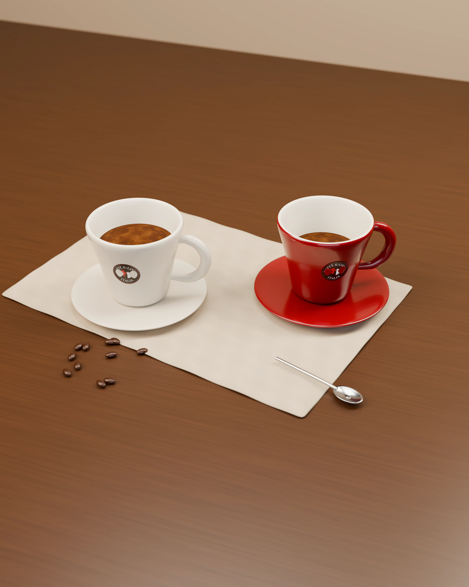 Dy filxhanë espresso Caffè Iuliano, një i bardhë dhe një i kuq, mbi një pecetë liri me kokrra kafeje
